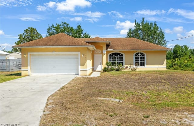 743 Switchboard Lane - 743 Switchboard Lane, Lehigh Acres, FL 33974