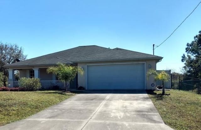 852 Chezy ST E - 852 Chezy Street, Lehigh Acres, FL 33974