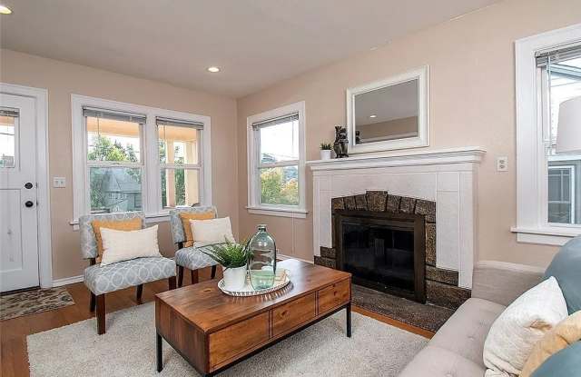 $1000 Off 1 months rent w/ move in by 12/1- Charming Ballard Home with Modern Upgrades  Classic Front Porch + Garage