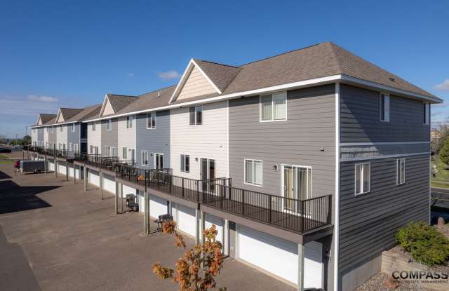 SPACIOUS TOWNHOME CONVENIENTLY LOCATED WITH IN-UNIT LAUNDRY