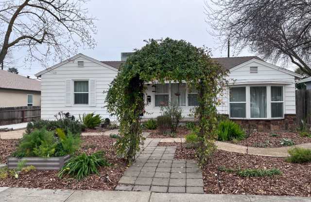 Adorable South Land Park home with fresh paint, hardwood floors and updated kitchen.