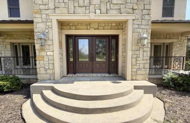 1026 S Farm to Market Rd 131 Denison, TX 75020- Luxurious 5-Bedroom, 3-Story Stone-Front Estate with Outdoor Entertainment Oasis in Denison, TX