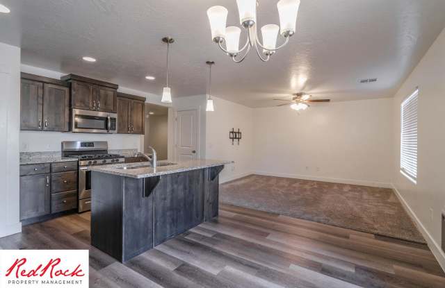 Photo of Move In Special - $500 Off First Months Rent! Stunning 4 Bedroom Townhome!