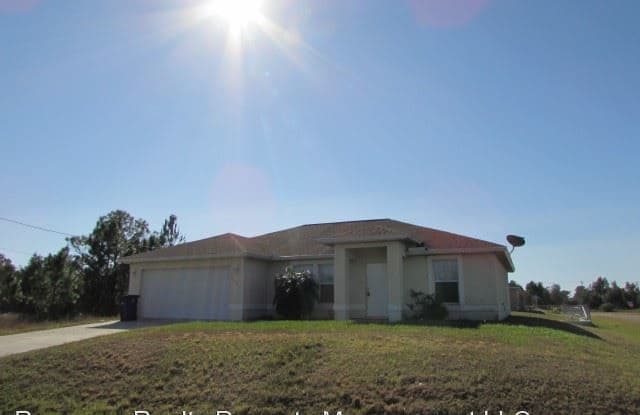 1238 Denver St E - 1238 Denham Street East, Lehigh Acres, FL 33974