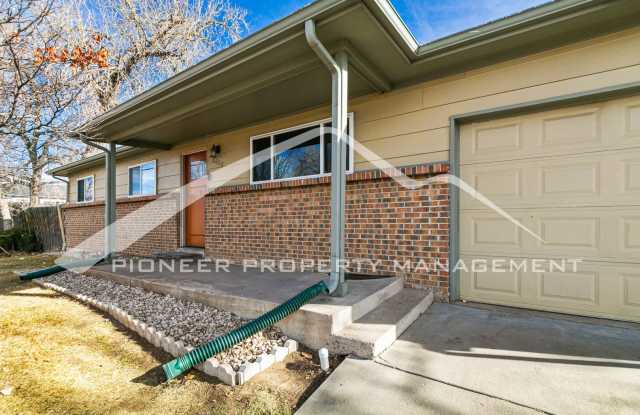 Spacious Home with Hardwood Floors, Fenced Yard, 1 Car Garage and Driveway Parking! photos photos