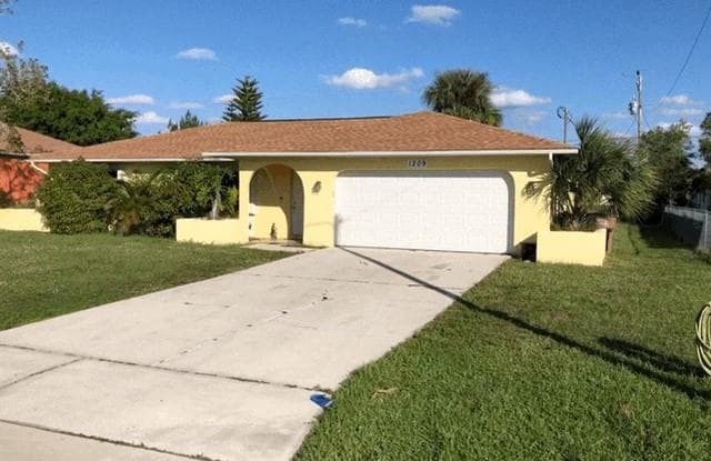 1209 SW 10th PL - 1209 Southwest 10th Place, Cape Coral, FL 33991