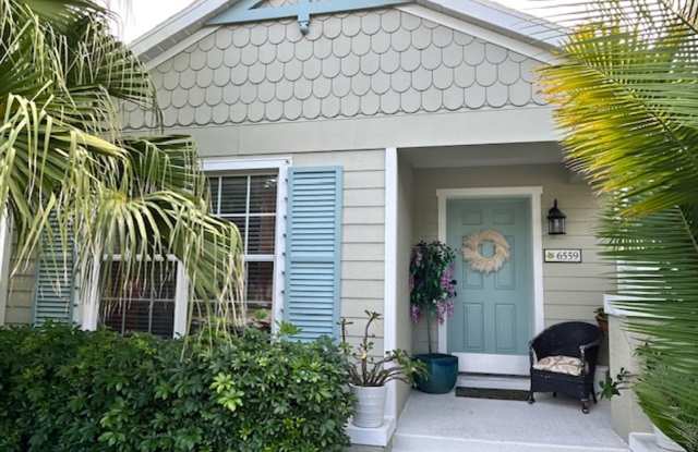 Photo of 2/2 UNFURNISHED - ADORABLE BUNGALOW- WITH GARAGE/GATED COMMUNITY