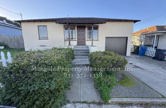 Charming 2-Bed 1-Bath Home in Seaside with Large Fenced Back Yard and Attached Garage