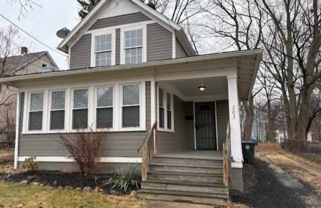 Classic Akron Home, Modern Convenience: Deck, First Floor Bedroom  Laundry and 2 Sunroom's
