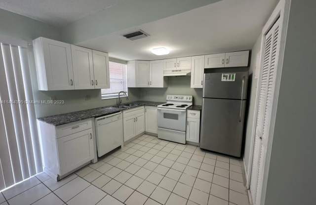 2606 NW 52nd Ave - 2606 Northwest 52nd Avenue, Lauderhill, FL 33313