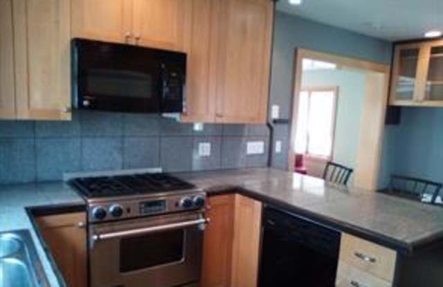 Photo of Affordable living Downtown Rochester hardwood floors and granite