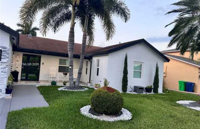 9571 NW 52nd St