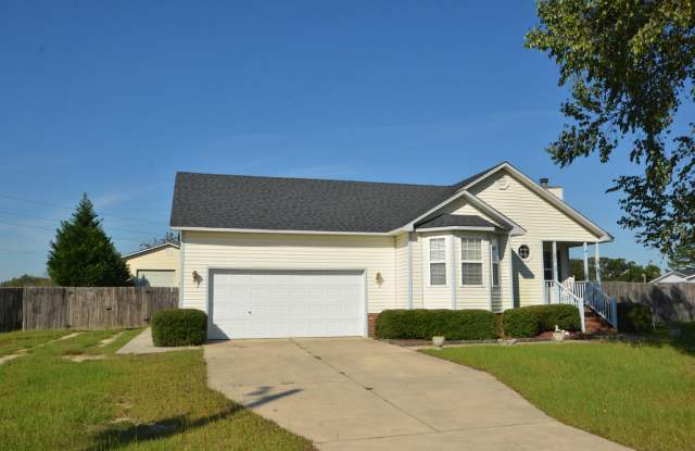 HUGE DETACHED GARAGE with 12' Door! 3 Bed/2 Bath, Laminate Flooring Plus an Attached Double Garage! Stoney Point/Jack Britt School District!