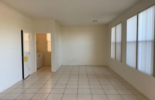 TWO STORY 4 BED 2.5 BATH HOME IN THE CACTUS SPRINGS GATED COMMUNITY