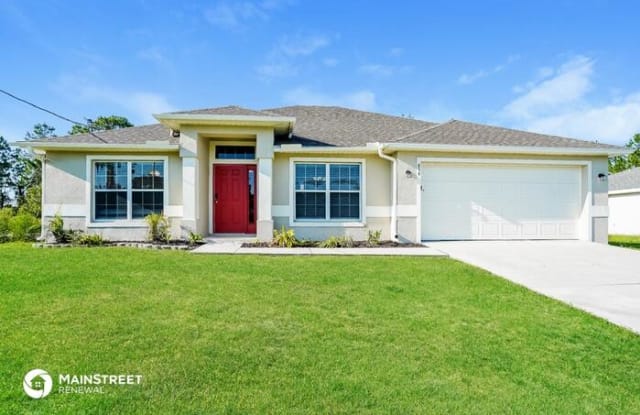 854 Chezy Street East - 854 Chezy Street East, Lehigh Acres, FL 33974