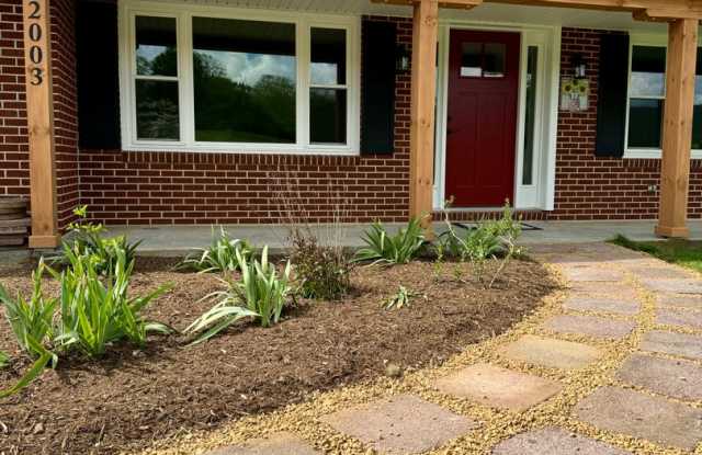 Exquisite Brick Ranch with Modern Upgrades, Countryside Charm And Two Car Garage - 2003 Linwood Lane, Blacksburg, VA 24060