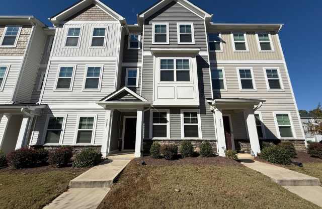 Photo of **OFFERING RENT PROMOTION FOR FIRST 6 MONTHS, WAIVED APPLICATION FEES  $200 MOVE IN PROMOTION** Stunning 3BD, 2.5BA Raleigh Townhome with 1-Car Attached Garage in Great Location Within an HOA Community