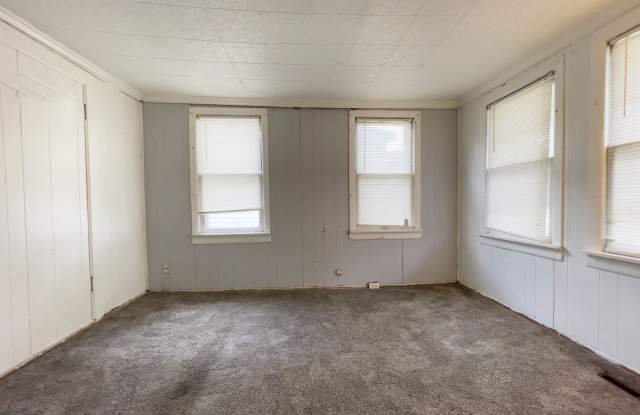 Fall into this cozy 3-Bedroom Home with a fenced in yard  detached garage!