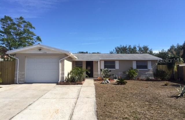 1705 STONE CREEK DRIVE - 1705 Stone Creek Drive, Tarpon Springs, FL 34689