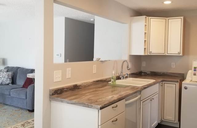 Photo of FURNISHED- 3 bed 2 bath single car detached garage, large lot Lawn care included