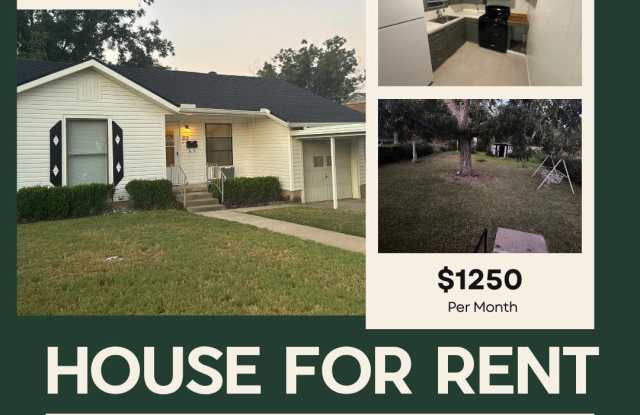 CUTE!!! 2 Bedroom 1 Bath Cute Home with Beautiful Landscaping and Garage