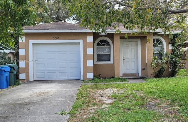 330 NE 34th Ct - 330 Northeast 34th Court, Oakland Park, FL 33334