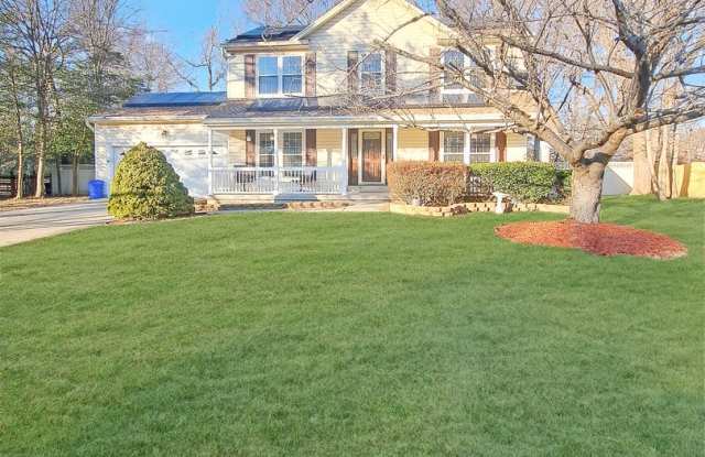 Pet Friendly and Zoned for North Point High School - 4/Bedroom, 3 Bathroom Home on Cul-de-Sac, Front Porch, 2-Car Garage, Lake View, Fenced In Yard, Large Patio and Covered Deck! - 2405 Altenburg Court, Waldorf, MD 20603