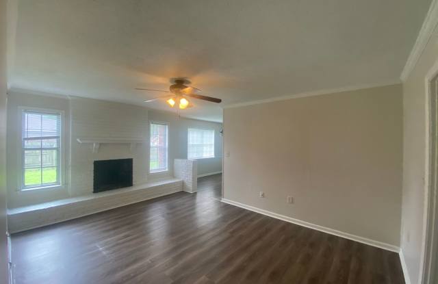 Renovated three bedroom two bath all laminate floors all stainless appliances covered parking no pets allowed