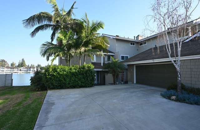 BREATHTAKING LAKE VIEW! Gated Lake community 3 bedroom plus 1 Den 2.5 bath Home