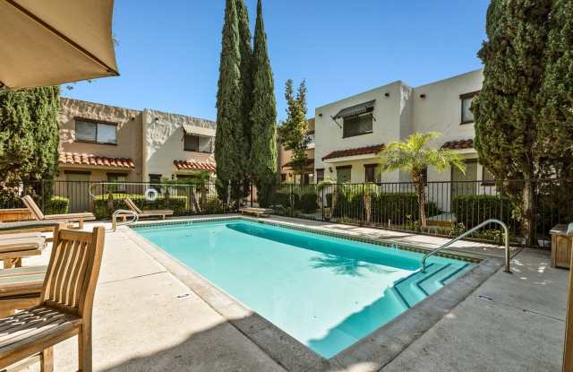 "Coming Soon" Awesome corner 2 Bedroom 2 Bath Townhome with large private patio (AC/Pool/Gated Parking,EV Chargers)