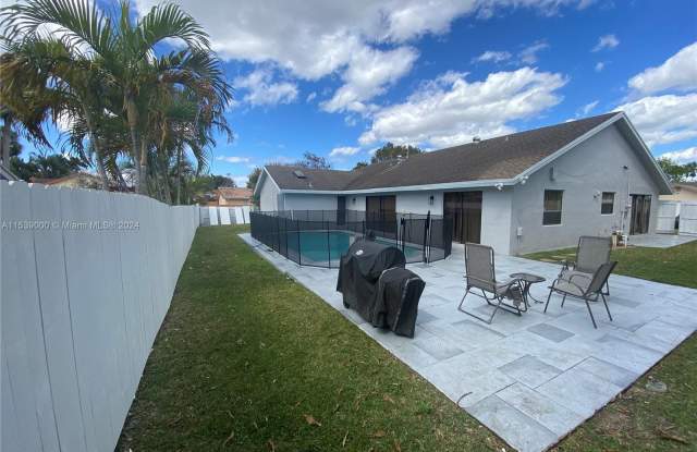 7098 NW 49th Pl - 7098 Northwest 49th Place, Lauderhill, FL 33319