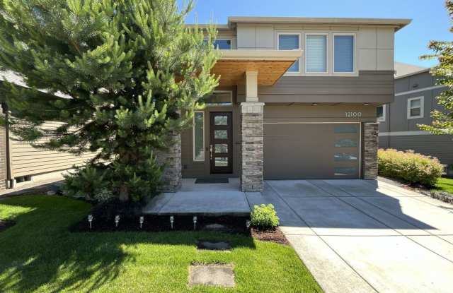 Elegant South Cooper Mountain Home with 4 Bedrooms, Bonus Room, Main-Level Suite & Designer Finishes