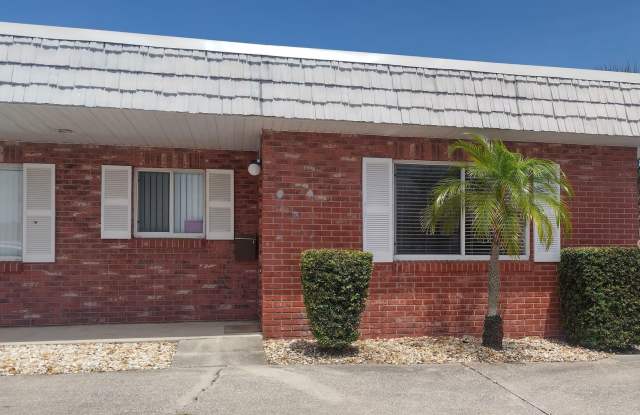 1 bedroom, 1 bathroom end unit condo beachside