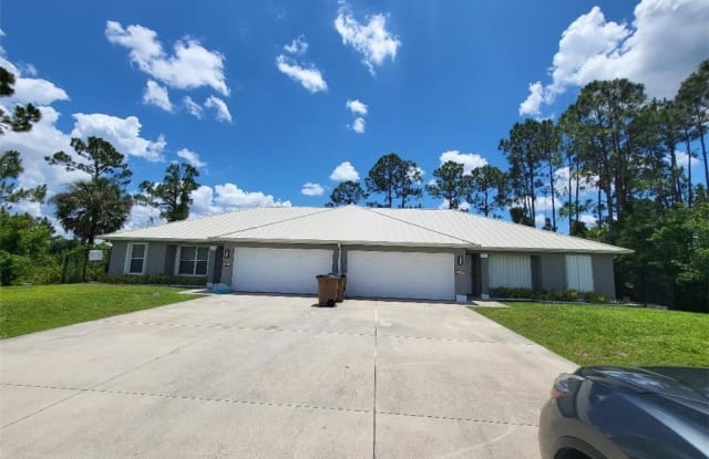 387 Carrillon Avenue S - 387 Carrillon Avenue South, Lehigh Acres, FL 33974