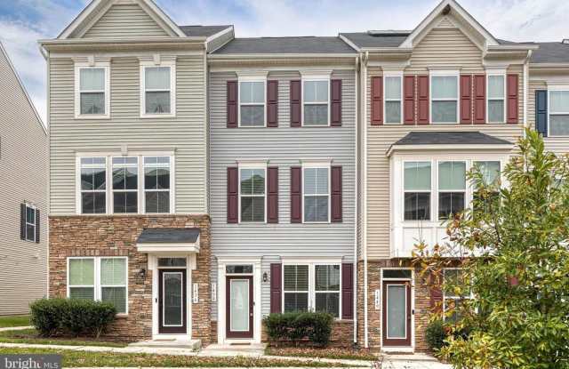 Photo of Well maintained three-story garage 2 bed 2.5 bath townhome in private Hanover community