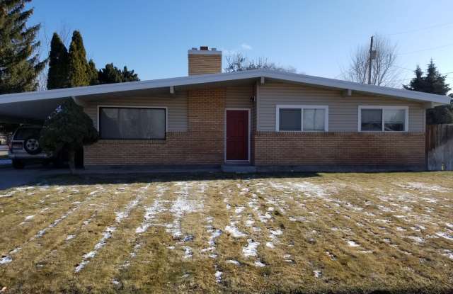 Photo of 3 bedroom, 1 bath rance style home on corner lot.