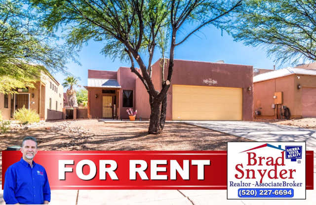 Photo of Gorgeous 3 Bedroom 2 Bathroom Home with Tile Throughout! Central A/C, 2 Car Garage!