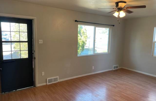 Adorable 2 Bedroom, 1 Bathroom Home with Huge Fully fenced Yard and detached garage, Move-In Ready!