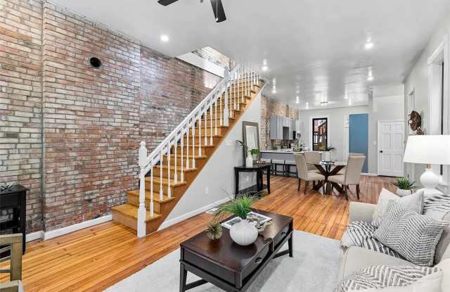 Exposed Brick Charm | Spacious 2-Bed, 2-Bath with Open-Concept Living