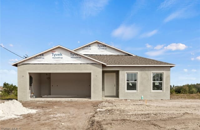 449 Grant Boulevard - 449 Grant Boulevard, Lehigh Acres, FL 33974