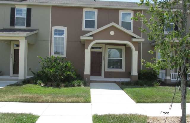 3 Bedroom 2.5 Bath 2 Car Garage 2 Story Townhome in gated community at 607 Tiger Bay Ct, Groveland, FL 34736.