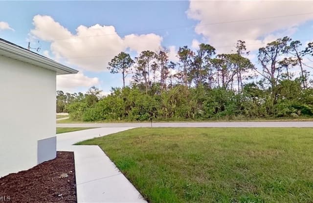 306 Harrison Drive - 306 Harrison Drive, Lehigh Acres, FL 33936