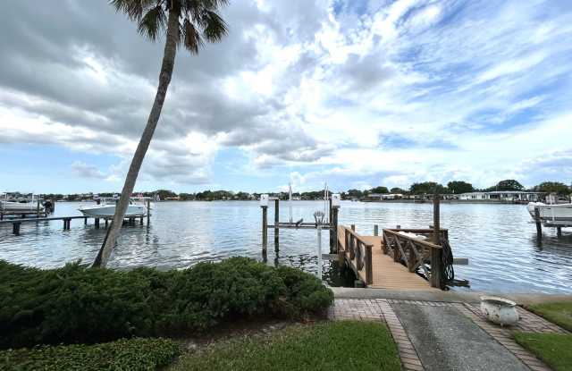 Photo of Classic waterfront Snell Isle Estates 3 Bed 2.5 Bath Home with private dock!