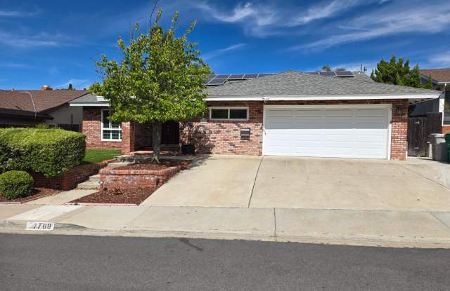 Stunning single-story Vista Del Cerro home with a private backyard oasis designed for effortless entertaining.