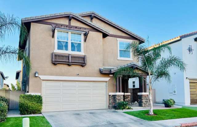 Completely Modern 4 Bedroom Home in the Riverwalk Community!