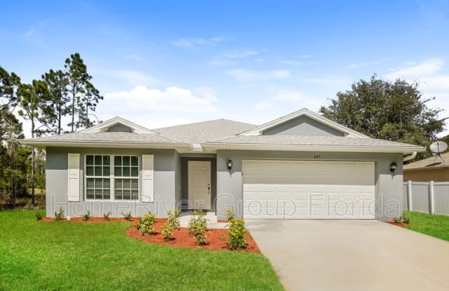 427 Hedgewood St - 427 Hedgewood Street, Lehigh Acres, FL 33974