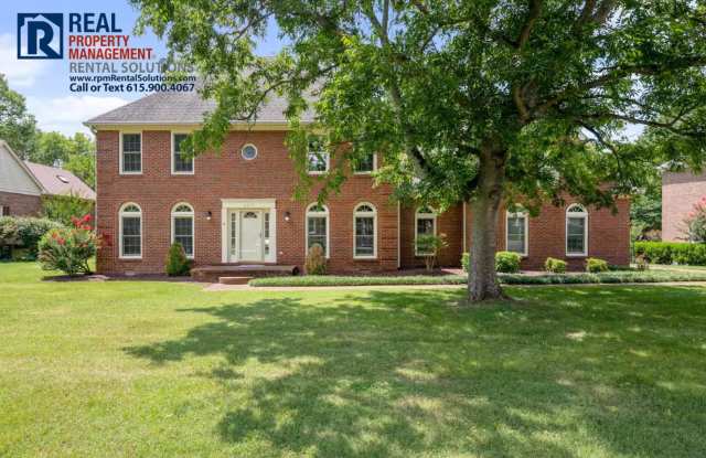 Photo of Amazing 4 bedroom plus office fully furnished home! Attached garage and large yard in quiet neighborhood