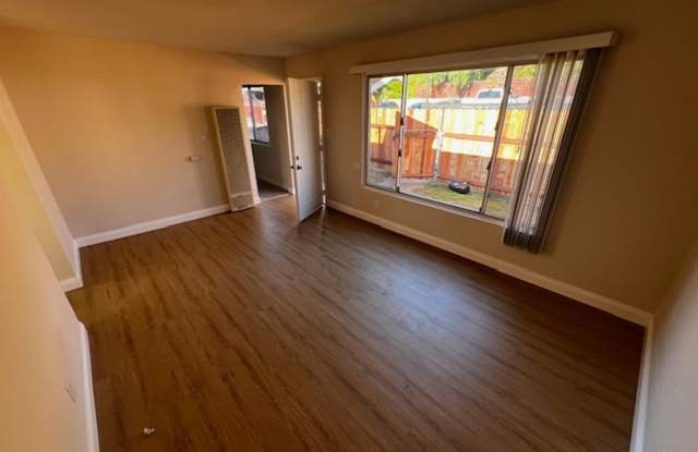 Photo of 2br - 1/2 twin Home with yard , garage and lots of parking