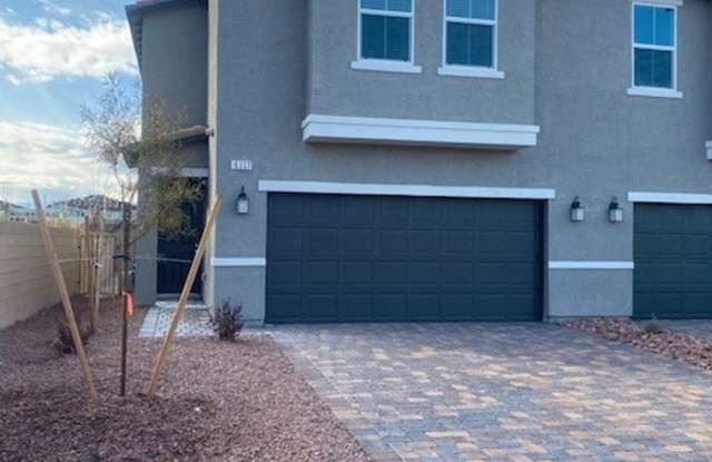 ** COMING SOON! ** Modern North Las Vegas Townhome with Granite Countertops, Covered Patio & Open-Concept Living