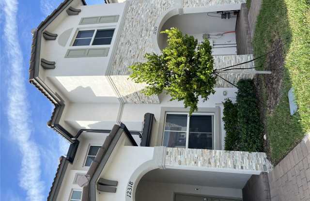 12318 N.W 23rd #court